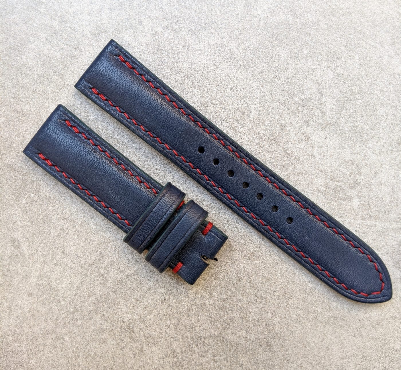 blue-watch-strap-red-stitching